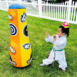 Girl in Karate uniform ready to strike Double Sided Target Bag