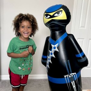 a-happy-boy-with-kid-punching-bag-ninja
