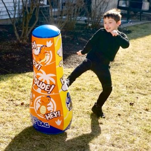 boy-kicks-target-bag-exercise