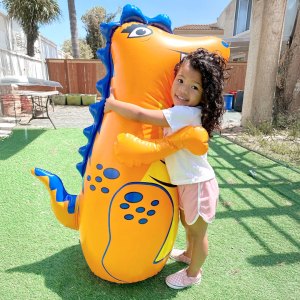 outdoor-playtime-little-girl-dinosaur-punching-bag-ai-extend-image-sides